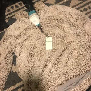 Thread and supply pullover